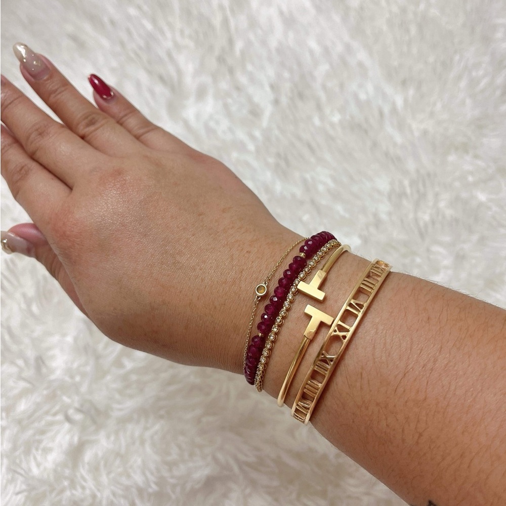 TIFFANY T WIRE BRACELET 18K Rose Gold, Size Medium. - Picture 16 of 17